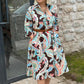 Colourful dress with 3/4-length sleeves and vintage floral print and pockets