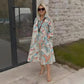 Colourful dress with 3/4-length sleeves and vintage floral print and pockets
